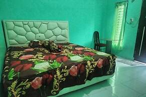 SPOT ON 92839 Nany Asoka Syariah Near Anyong Cafe Studio