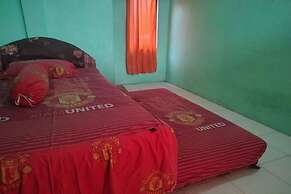 SPOT ON 92839 Nany Asoka Syariah Near Anyong Cafe Studio