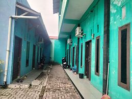 SPOT ON 92839 Nany Asoka Syariah Near Anyong Cafe Studio