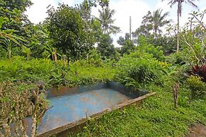 SPOT ON 92567 Jati Homestay Near Taman Suranadi