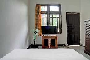 SPOT ON 92856 Home Stay Syariah Aom Kusman