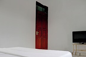 SPOT ON 92856 Home Stay Syariah Aom Kusman