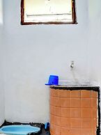 SPOT ON 92856 Home Stay Syariah Aom Kusman