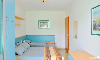 Luminous Beachside Flat-beahost