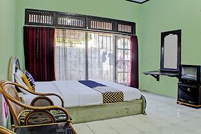 SPOT ON 92682 Badar Guest House Syariah