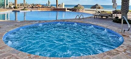 Quiet Beachfront Condo With Pools Private Beach