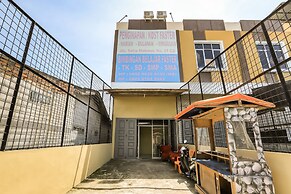 OYO 90009 Faster Inn 1