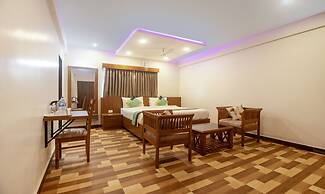 Treebo Elite Plaza, 700 Mtrs From Madikeri Fort