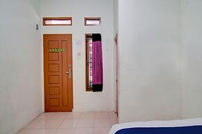 SPOT ON 92797 Awi Stay Syariah Near SIMPANG KAWASAN INDUSTRI WILMAR PE