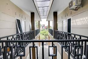 SPOT ON 92797 Awi Stay Syariah Near SIMPANG KAWASAN INDUSTRI WILMAR PE