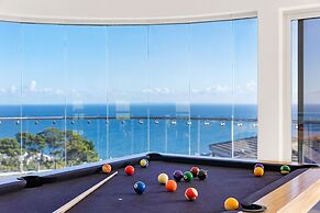 Cliffside Castle With Bay And City Views