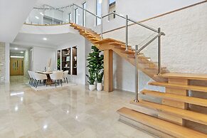 Cliffside Castle With Bay And City Views