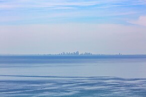 Cliffside Castle With Bay And City Views