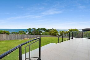 Cliffside Castle With Bay And City Views
