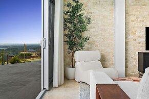 Cliffside Castle With Bay And City Views