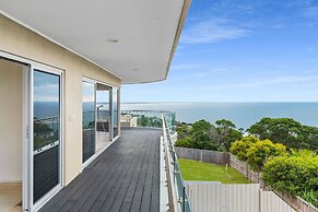 Cliffside Castle With Bay And City Views