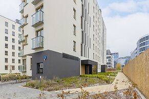 Służewiec Apartment by Renters