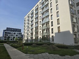 Służewiec Apartment by Renters