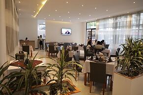 Villa Alpha International Hotel