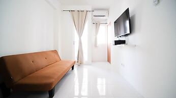 Cozy Living And Tidy 2Br At Puncak Dharmahusada Apartment