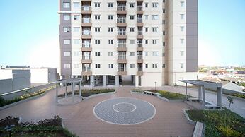 Cozy Living And Tidy 2Br At Puncak Dharmahusada Apartment