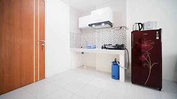 Cozy Living And Tidy 2Br At Puncak Dharmahusada Apartment