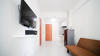 Cozy Living And Tidy 2Br At Puncak Dharmahusada Apartment