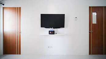 Cozy Living And Tidy 2Br At Puncak Dharmahusada Apartment