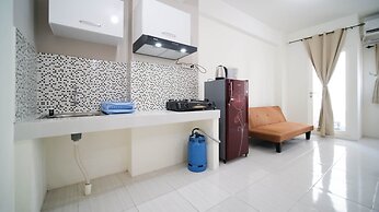 Cozy Living And Tidy 2Br At Puncak Dharmahusada Apartment