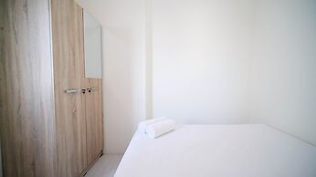 Cozy Living And Tidy 2Br At Puncak Dharmahusada Apartment