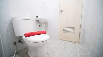 Cozy Living And Tidy 2Br At Puncak Dharmahusada Apartment