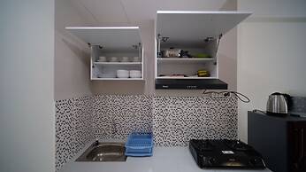 Cozy Living And Tidy 2Br At Puncak Dharmahusada Apartment