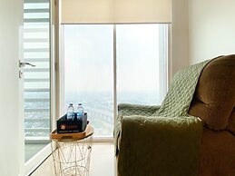 Modern And Homey Studio At Grand Kamala Lagoon Apartment