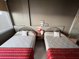 Marthas Suites & Hotel