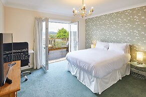 Host Stay Coach Cottage