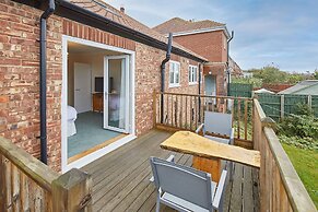 Host Stay Coach Cottage