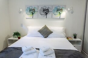 Apartamento com quintal na Praça do Pôr do Sol