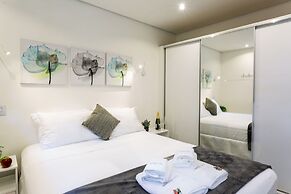 Apartamento com quintal na Praça do Pôr do Sol