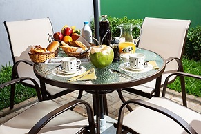 Apartamento com quintal na Praça do Pôr do Sol