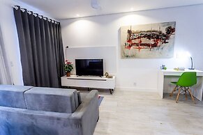 Apartamento com quintal na Praça do Pôr do Sol