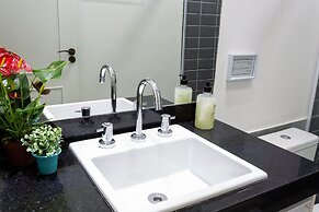 Apartamento com quintal na Praça do Pôr do Sol