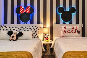 Chic Modern Condo With Spacious Layout and Mickey Bedroom