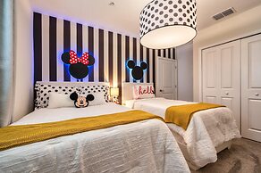 Chic Modern Condo With Spacious Layout and Mickey Bedroom
