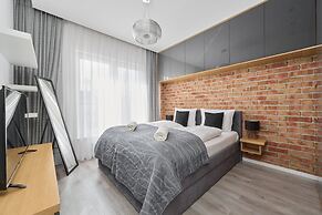 Nowa Papiernia Apartments by Renters