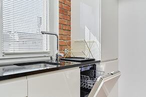 Nowa Papiernia Apartments by Renters