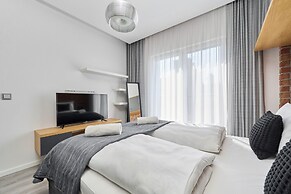 Nowa Papiernia Apartments by Renters