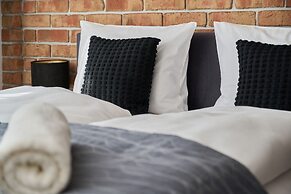 Nowa Papiernia Apartments by Renters