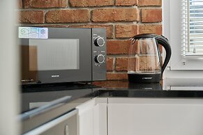 Nowa Papiernia Apartments by Renters