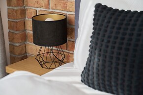 Nowa Papiernia Apartments by Renters