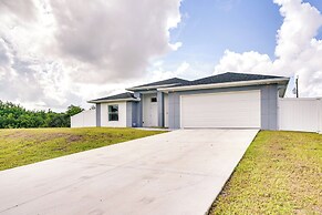 Comfy Lehigh Acres Getaway w/ Yard & Fireplace